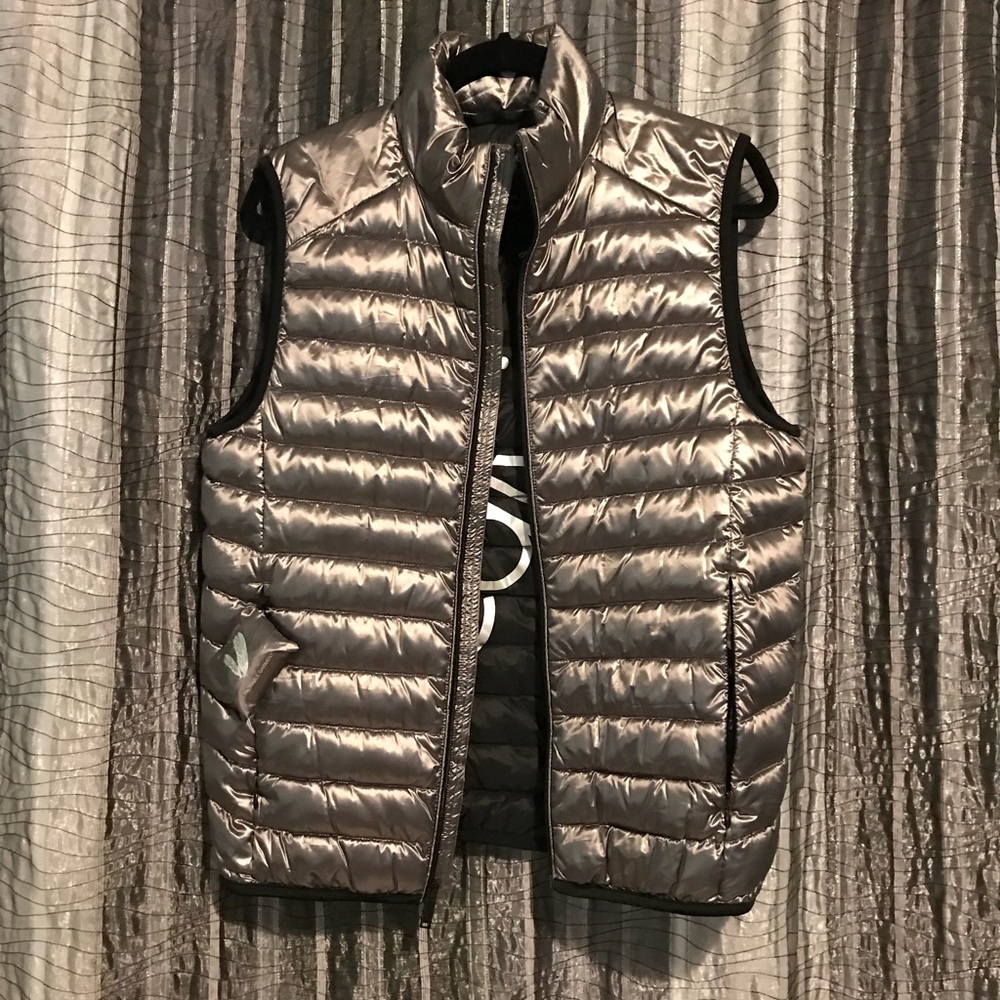 CK packable down vest.